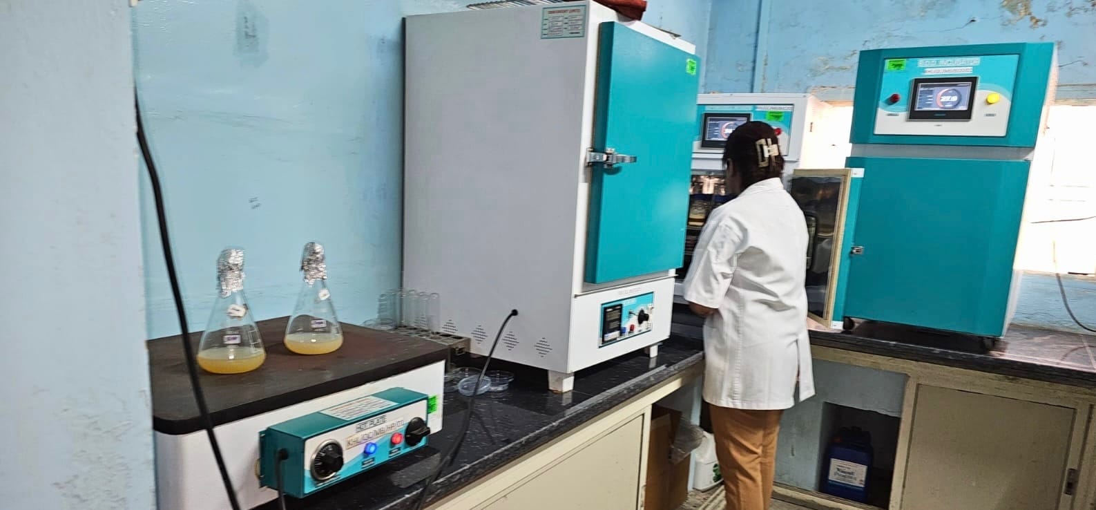 Incubators and culture flasks in the microbiology laboratory